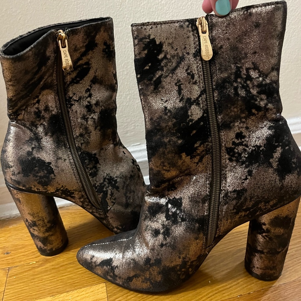 Cowboy style pointed toe silver and back bootie heels